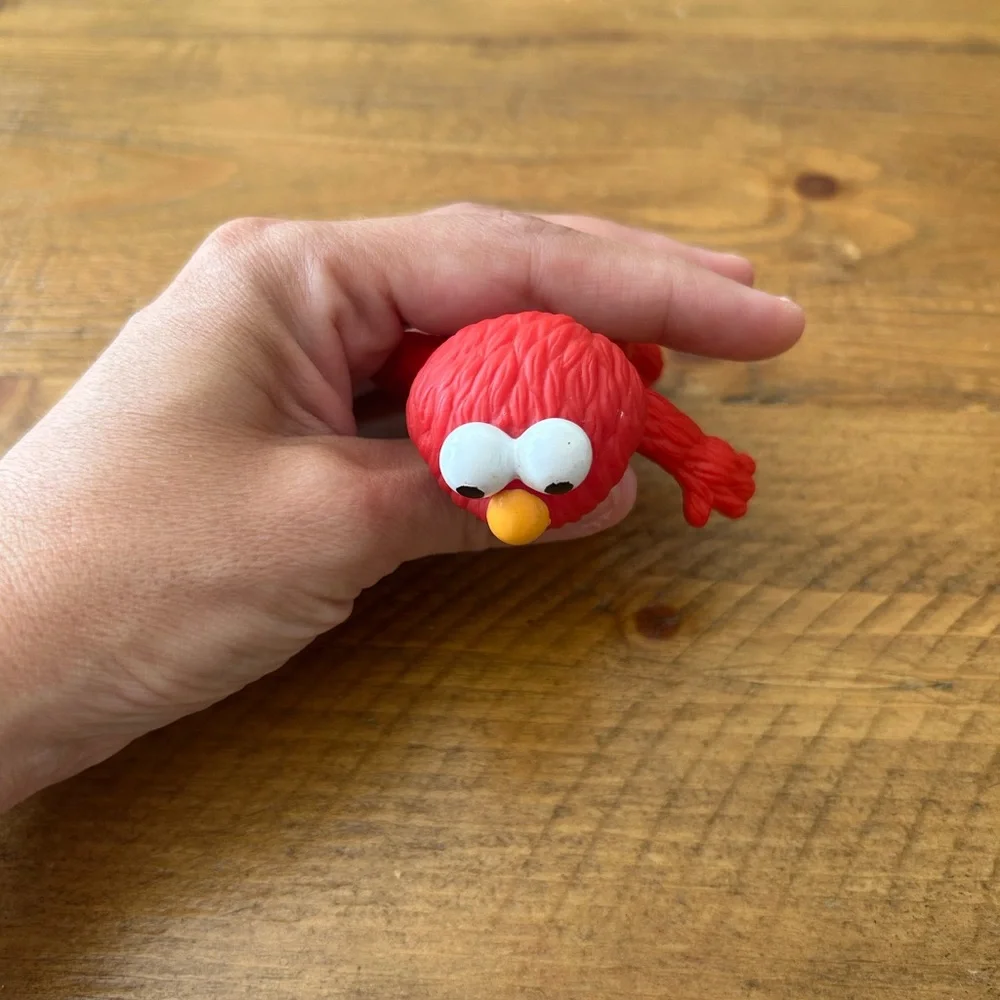 Applause Elmo figurine as is can be used as a cake topper